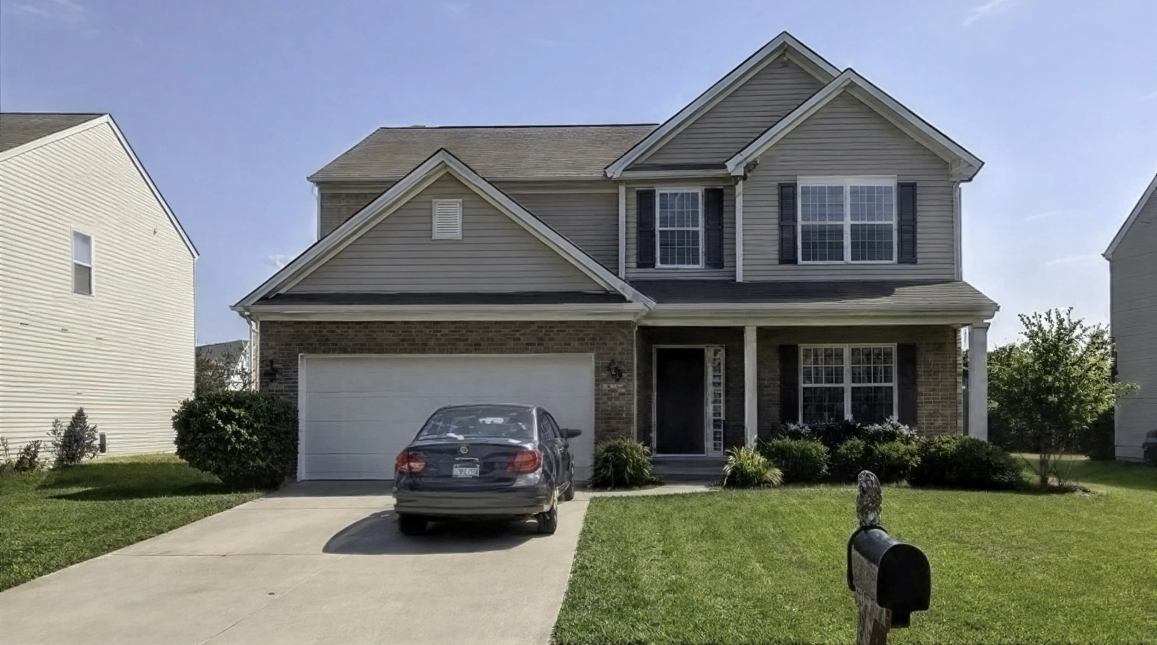 Before AI enhancement: Amateur real estate photo of a dim living room