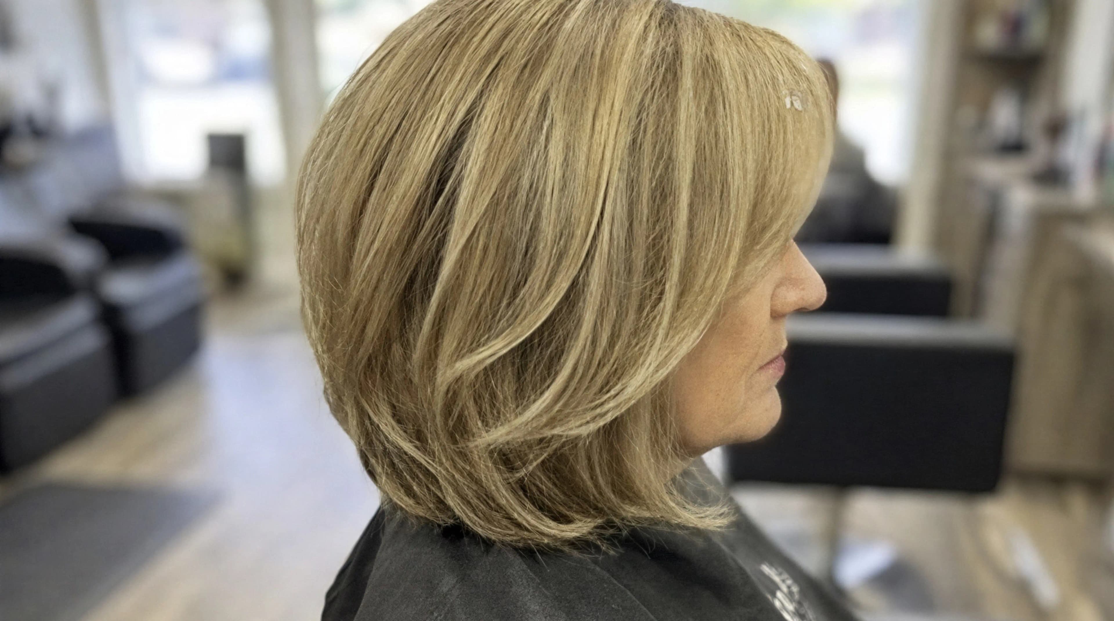 Before AI enhancement: Unprocessed photo of a salon interior with flat lighting