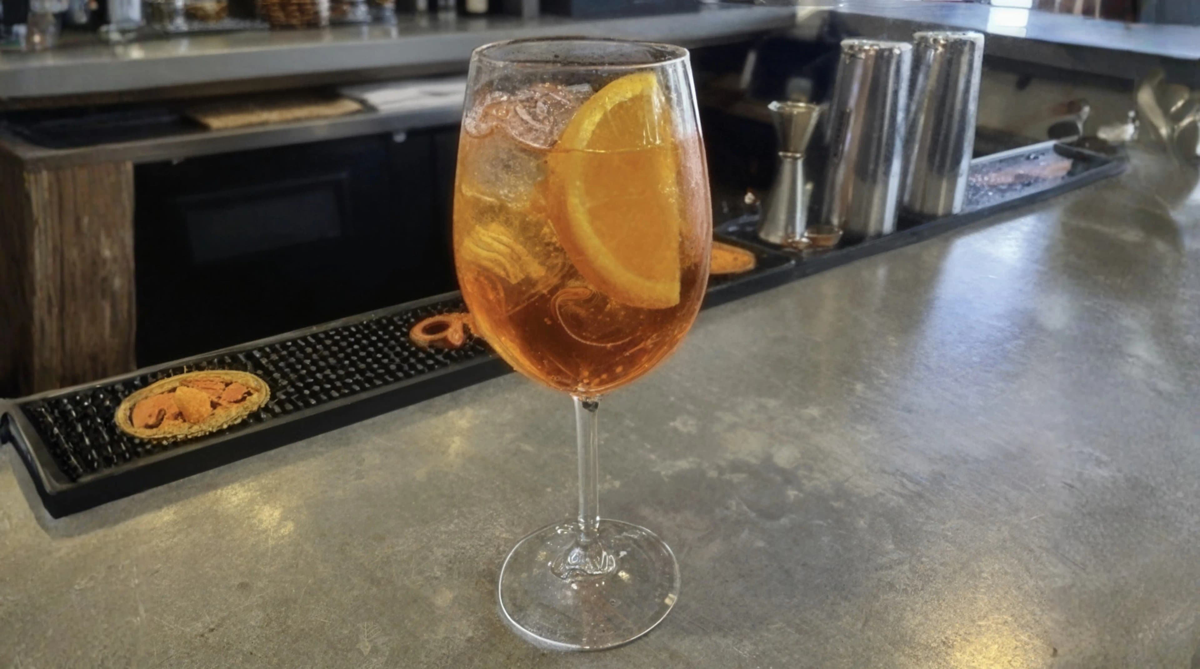 Before AI enhancement: Dark and flat amateur bar interior shot